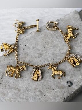 Danbury Mint gold plated majestic rhinestone horses charm bracelet 6.75in